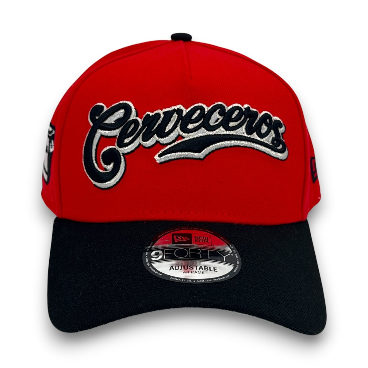 Red and black cap with 'Cerveceros' text on a white background