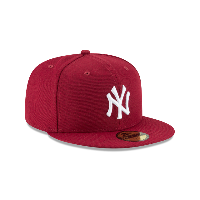 Red baseball cap with white logo on a white background