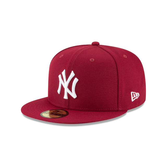 Red baseball cap with white logo on a white background