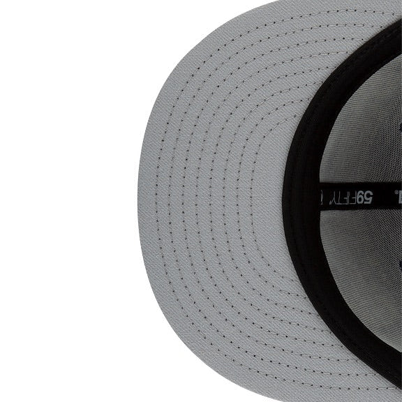 Close-up of a gray cap with black rim on a white background
