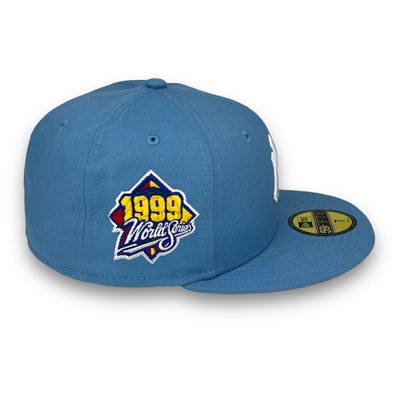Blue baseball cap with 1999 World Series logo on a white background
