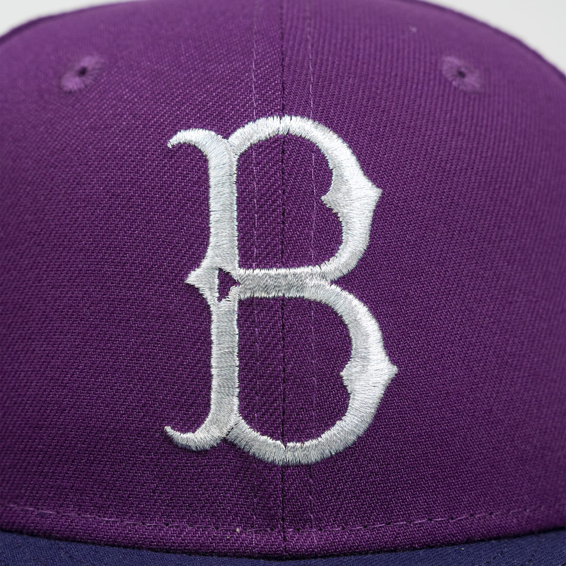 Purple cap with a white embroidered letter 'B' on a plain background- The Pirates Brooklyn 42 ASG 59FIFTY Grape New Era Hat