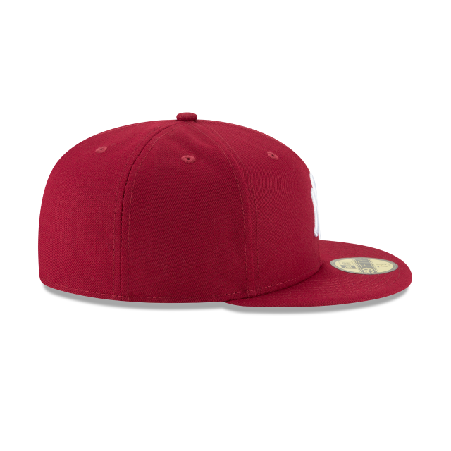 Red baseball cap on a white background
