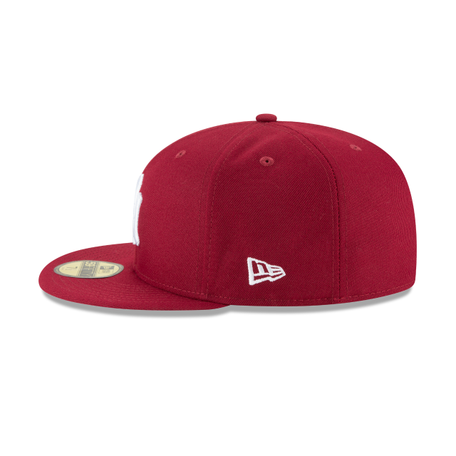 Red baseball cap with a logo on a white background