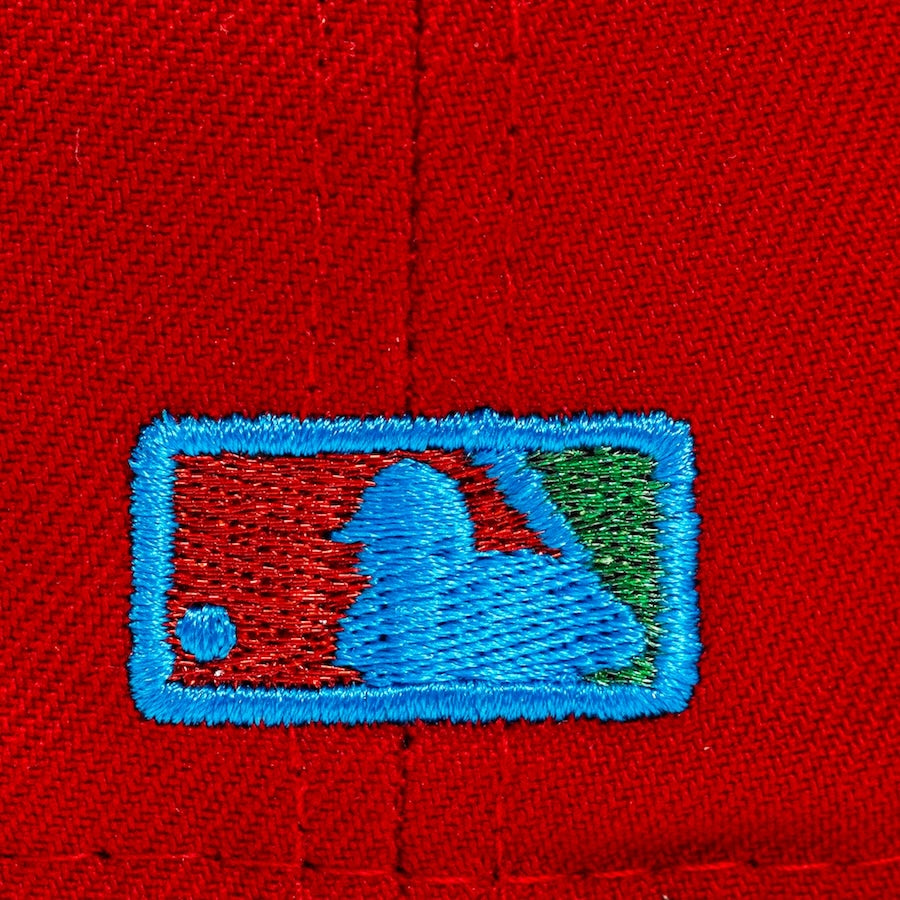 Embroidered logo on a red background