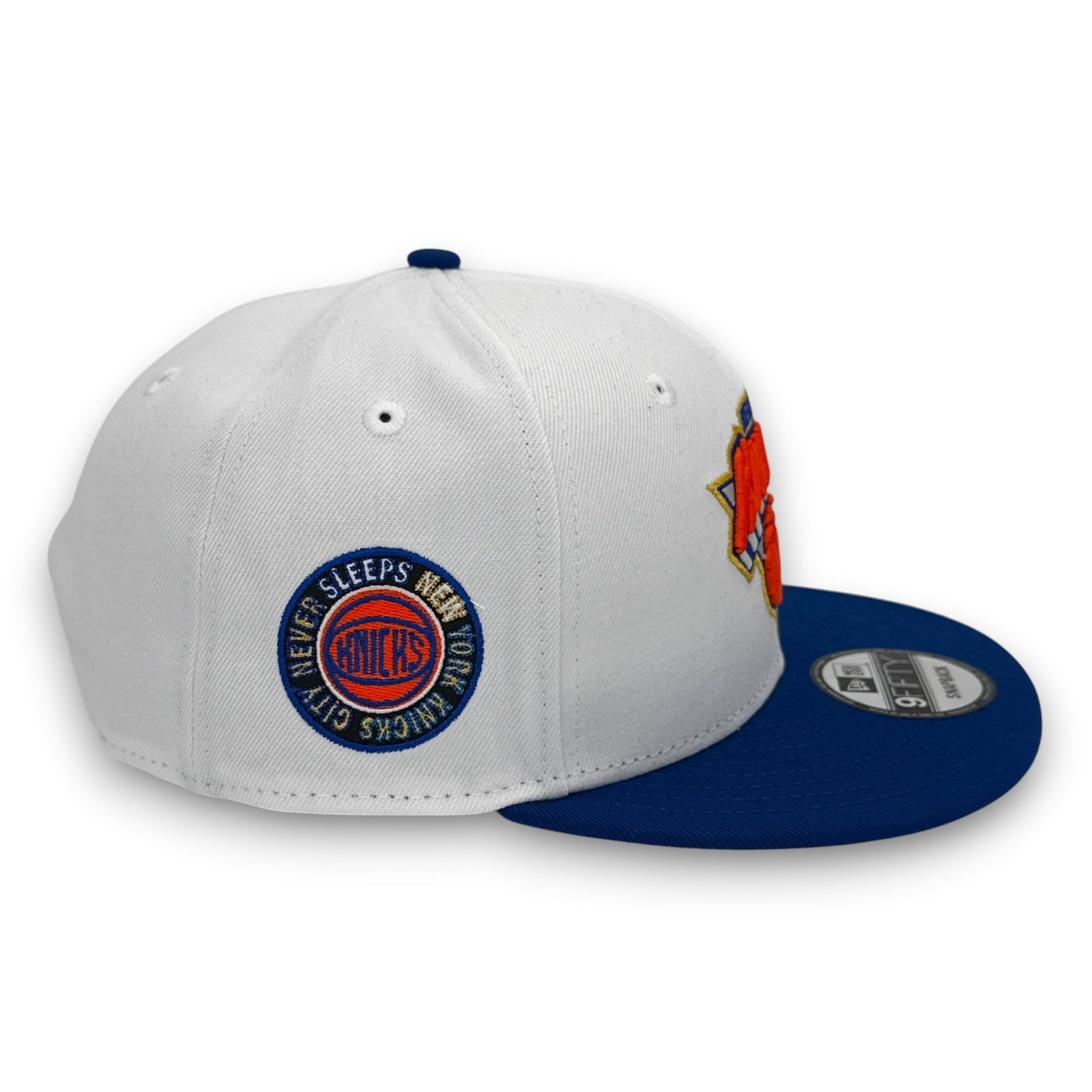 Gray and blue cap with New York Knicks logo on a white background