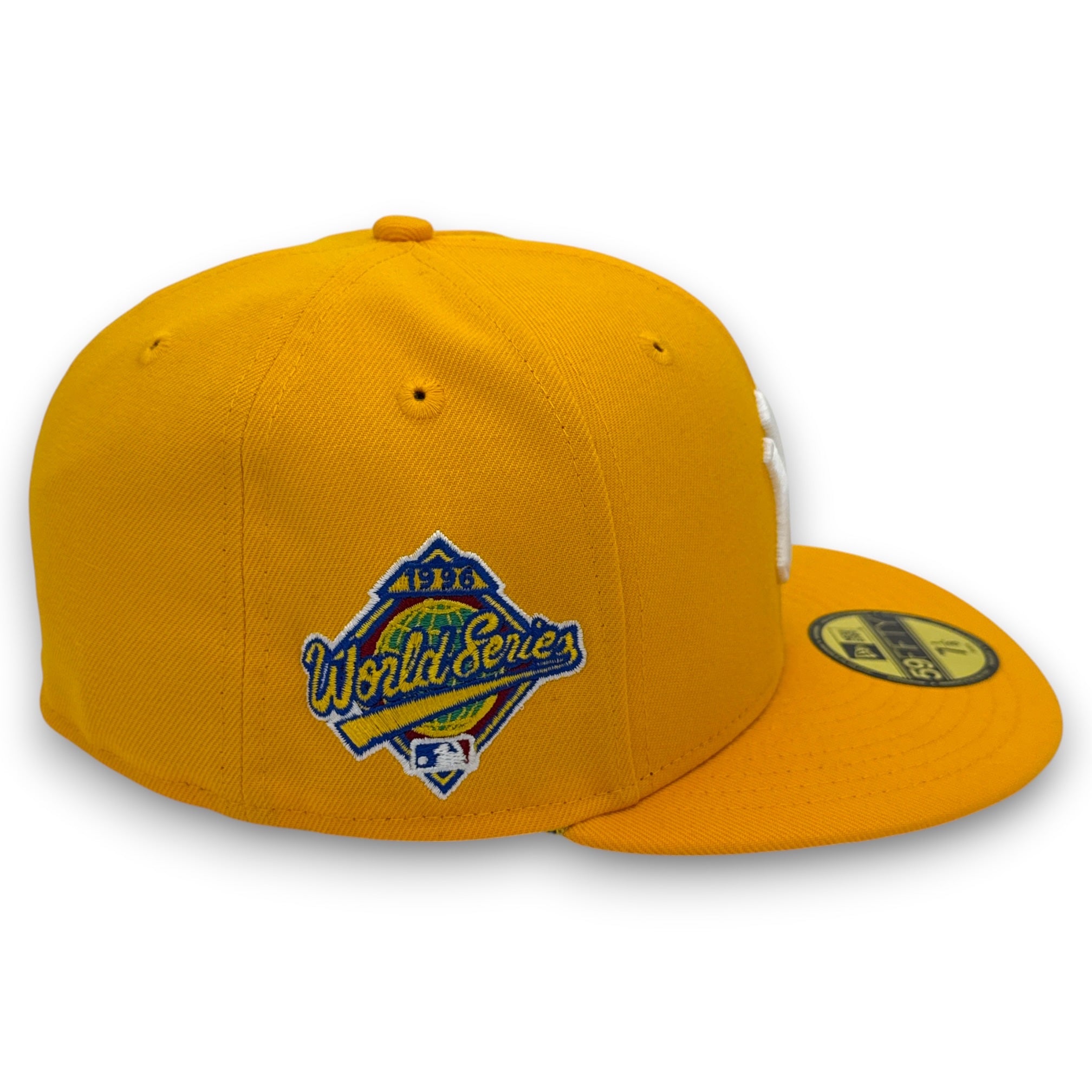 Yellow baseball cap with World Series logo on a white background