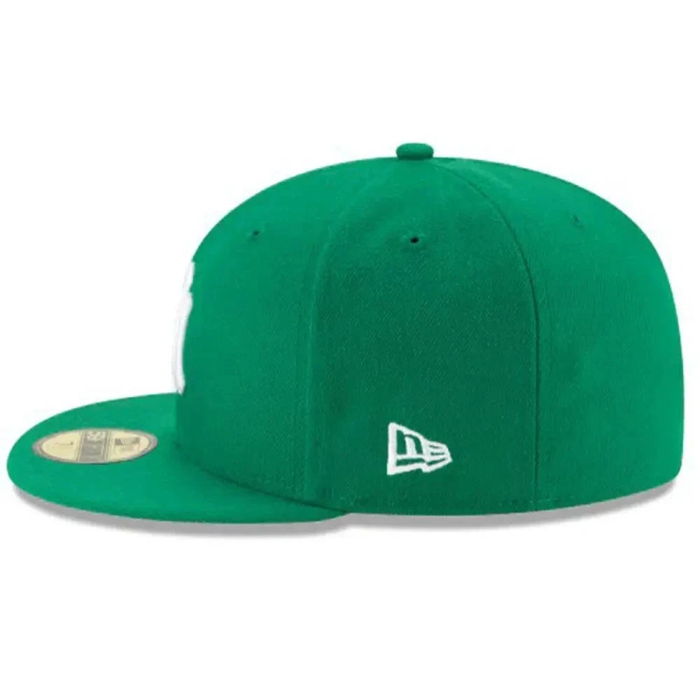 Green baseball cap with New Era logo on a white background