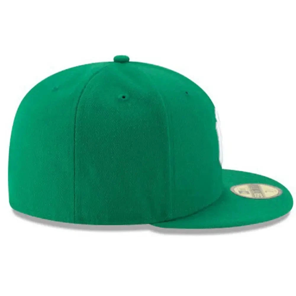 Green baseball cap on a white background