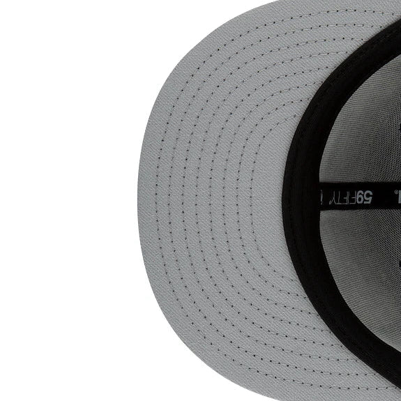 Close-up of a gray cap with black mesh and visible brand logo on a white background