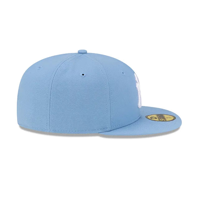 Light blue baseball cap on a white background