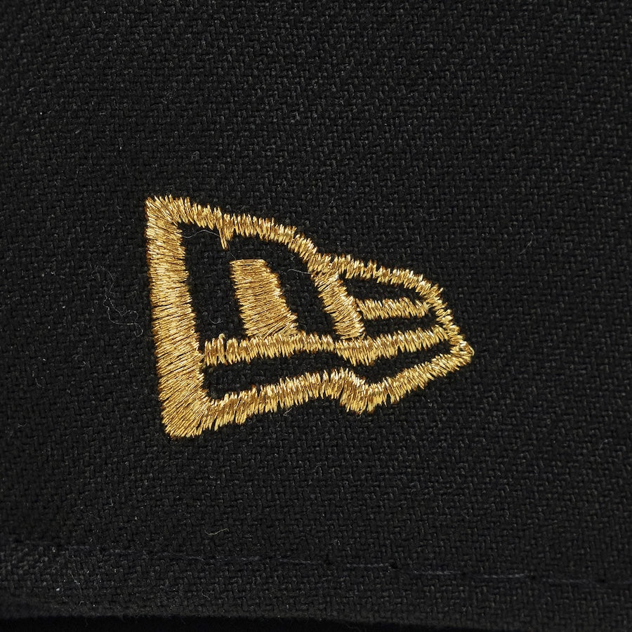 Gold embroidered logo on a black background. Bradenton Marauders